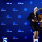 University of Pennsylvania swimmer Lia Thomas (L) of the University of Pennsylvania stands on the podium after winning the 500-yard freestyle as other medalists (L-R) Emma Weyant, Erica Sullivan and Brooke Forde pose for a photo at the NCAA Division I Women’s Swimming & Diving Championship in Atlanta, Ga., March 17, 2022. (Justin Casterline/Getty Images)